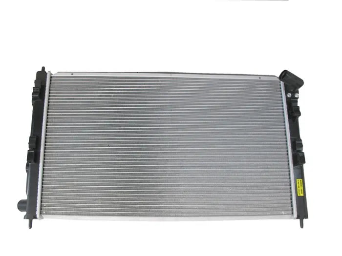 A silver aluminum radiator with black plastic end tanks and hoses, shown against a plain white background.

