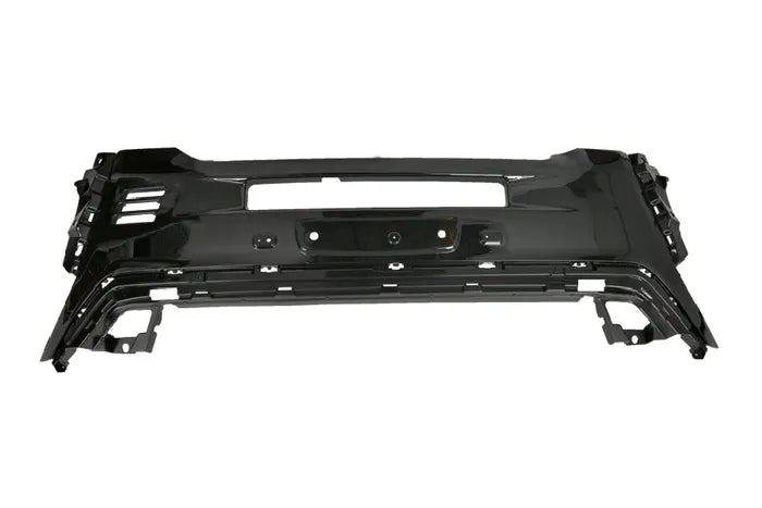 A black plastic vehicle front bumper assembly with mounting holes and structural brackets, shown against a plain white background.


