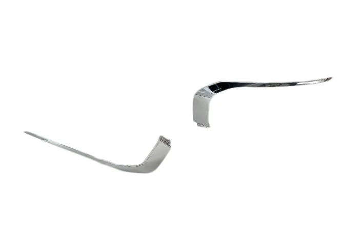 Two chrome car spoilers on a white background

