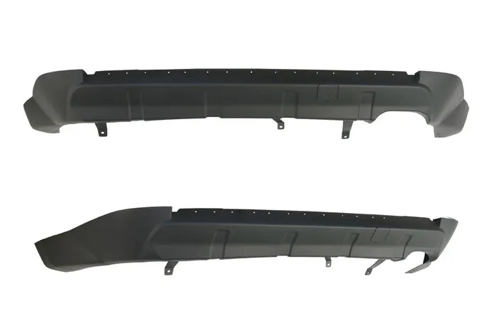 Two black car bumper parts on a white background

